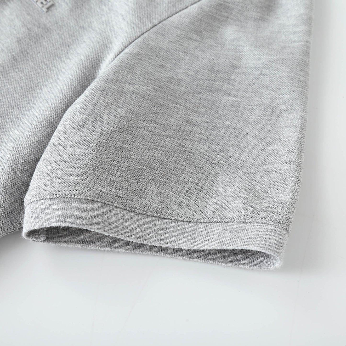 Solid color polo